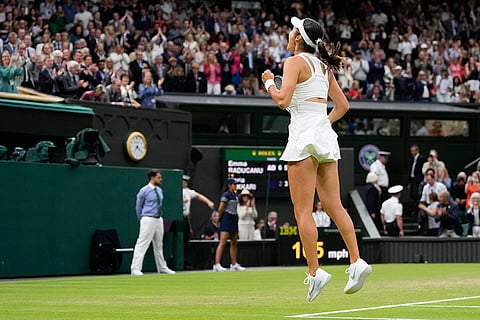 Emma Raducanu reacts after defeating Maria Sakkari